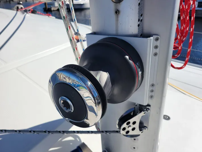  Yacht Photos Pics Winch on 2006 Fountaine Pajot LAVEZZI catamaran, with ropes and pulleys visible.