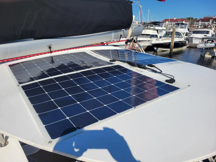  Yacht Photos Pics Solar panels on 2006 Fountaine Pajot LAVEZZI catamaran docked at marina.