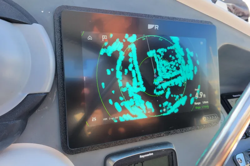  Yacht Photos Pics Radar display on 2006 Fountaine Pajot LAVEZZI catamaran, showing navigation data.