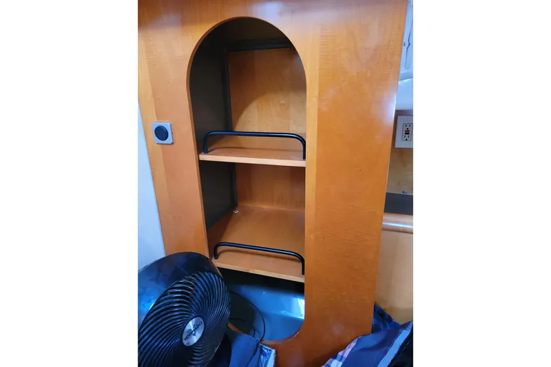  Yacht Photos Pics Wooden shelving unit inside 2006 Fountaine Pajot LAVEZZI yacht interior.