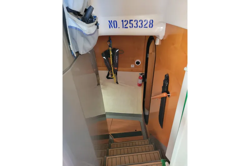  Yacht Photos Pics Interior view of 2006 Fountaine Pajot LAVEZZI catamaran with stairs and safety equipment.
