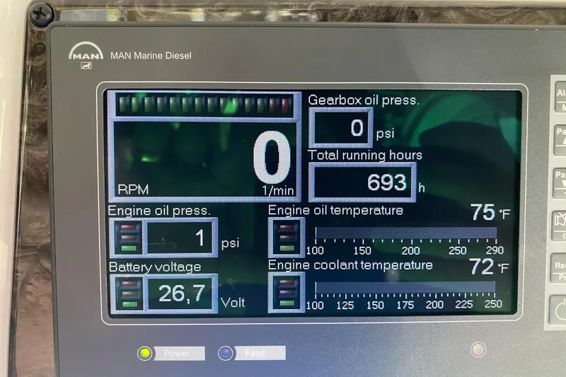  Yacht Photos Pics MAN Marine Diesel display on 2012 Sea Ray 610 Sundancer showing engine metrics.