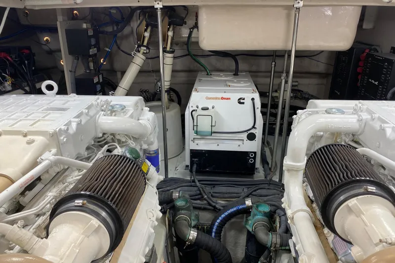  Yacht Photos Pics Engine room of 2012 Sea Ray 610 Sundancer with Cummins Onan generator and dual engines.
