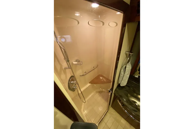  Yacht Photos Pics Luxurious shower in 2012 Sea Ray 610 Sundancer yacht bathroom.