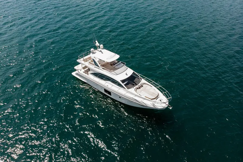 Mawi Yacht Photos Pics Aerial view of 2019 Azimut FLY 55 yacht on open water.