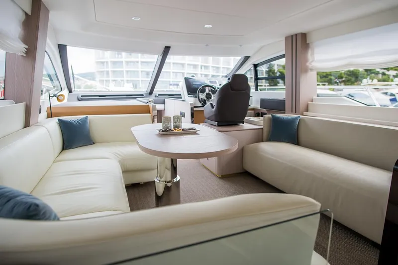 Mawi Yacht Photos Pics Luxurious interior of 2019 Azimut FLY 55 yacht with elegant seating and modern design.