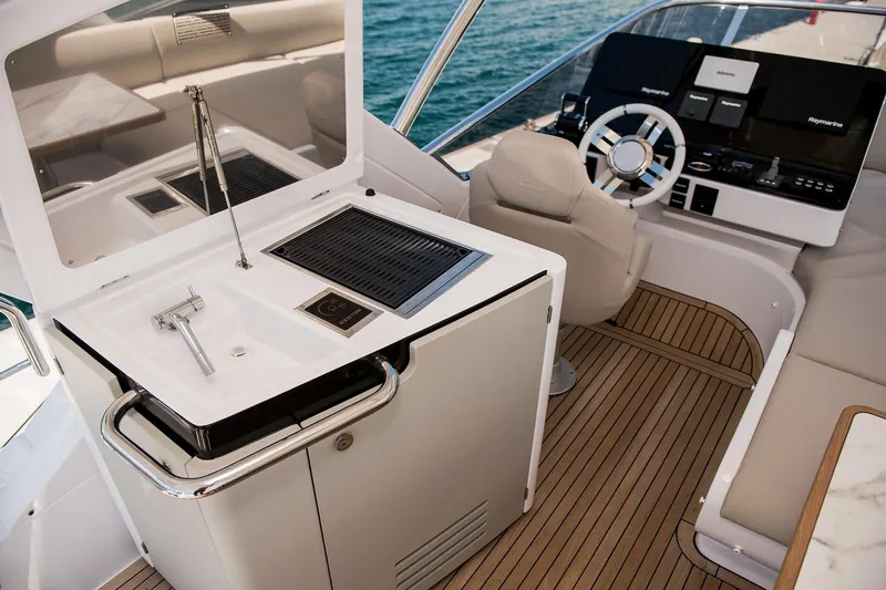 Mawi Yacht Photos Pics 2019 Azimut FLY 55 yacht helm with modern controls and sleek design.