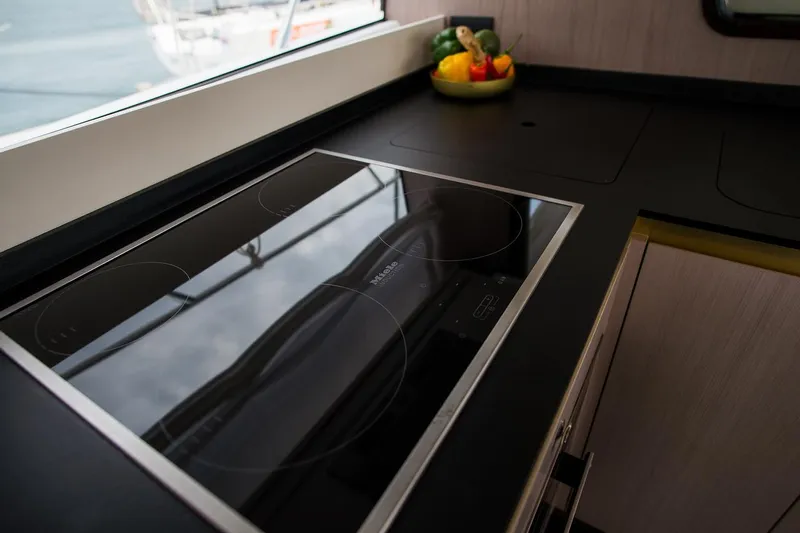Mawi Yacht Photos Pics Modern kitchen in 2019 Azimut FLY 55 yacht with sleek induction cooktop.