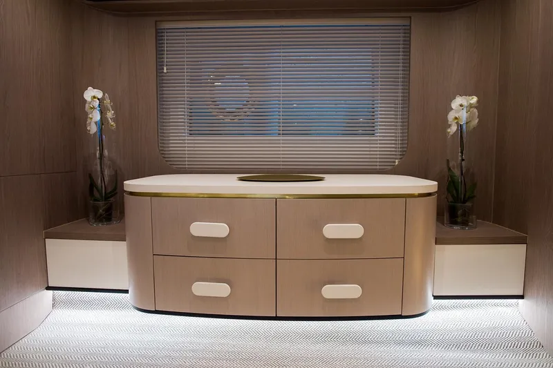 Mawi Yacht Photos Pics Luxurious interior of 2019 Azimut FLY 55 yacht with elegant cabinetry and floral decor.