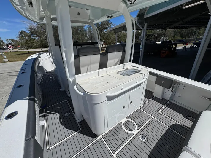  Yacht Photos Pics 2019 Fountain 39 NX boat interior with sleek seating and modern design.