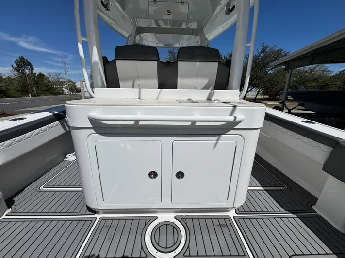  Yacht Photos Pics 2019 Fountain 39 NX boat interior with seating and storage, featuring sleek design and modern amenities.