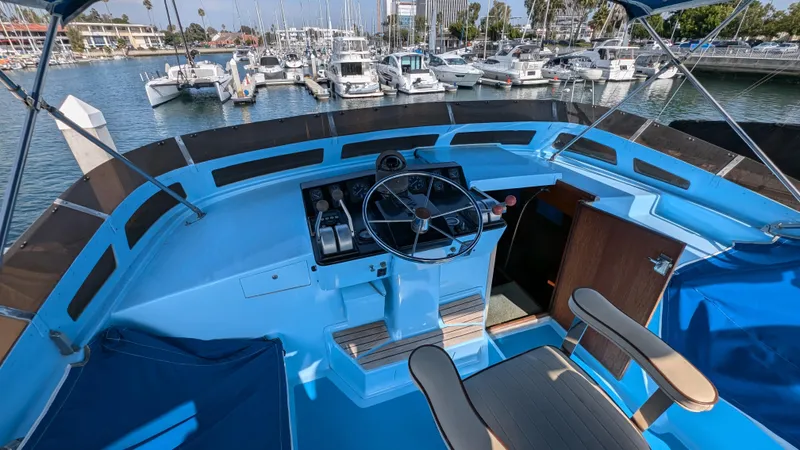 Guadalupe Yacht Photos Pics 1989 Ditmar & Donaldson Custom Cruiser boat helm at marina.