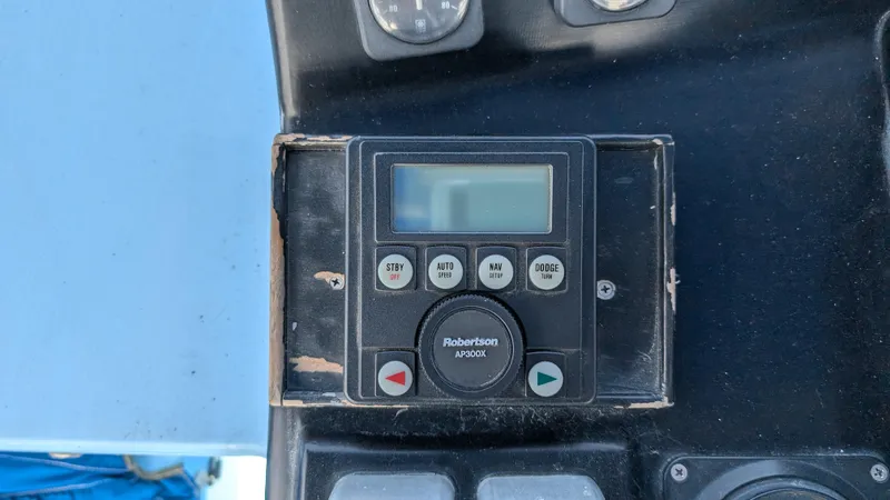 Guadalupe Yacht Photos Pics 1989 Ditmar & Donaldson Custom Cruiser control panel with Robertson AP300X autopilot.