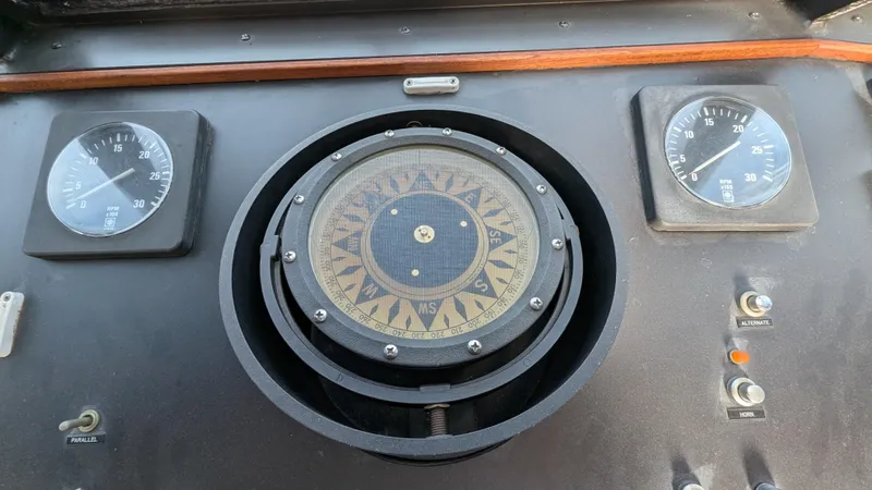 Guadalupe Yacht Photos Pics 1989 Ditmar & Donaldson Custom Cruiser dashboard with compass and gauges.