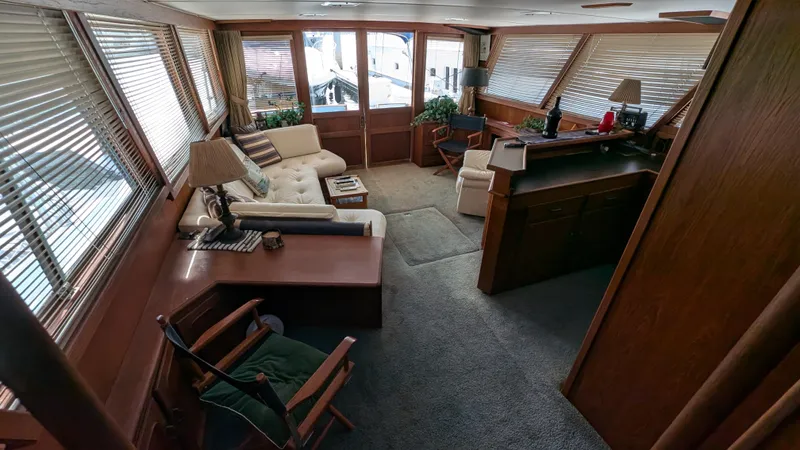 Guadalupe Yacht Photos Pics Interior of 1989 Ditmar & Donaldson Custom Cruiser with cozy seating and wooden accents.