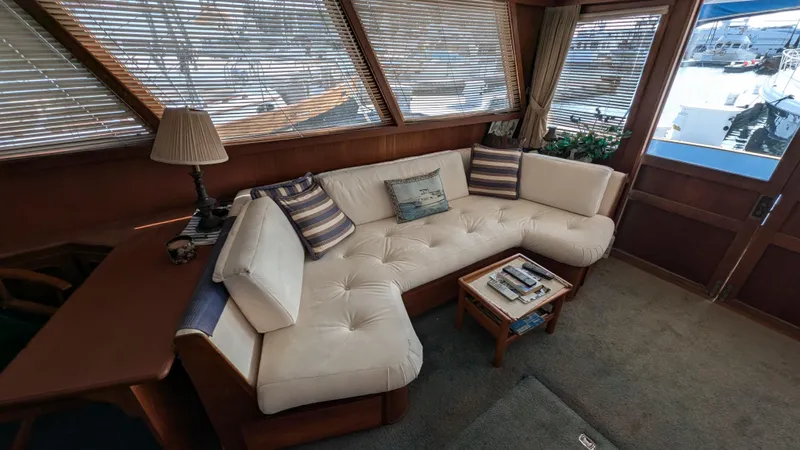 Guadalupe Yacht Photos Pics Luxurious 1989 Ditmar & Donaldson Custom Cruiser interior with plush seating and elegant decor.
