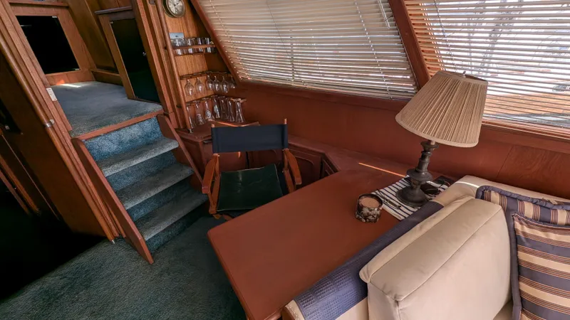 Guadalupe Yacht Photos Pics Interior of 1989 Ditmar & Donaldson Custom Cruiser with cozy seating and nautical decor.