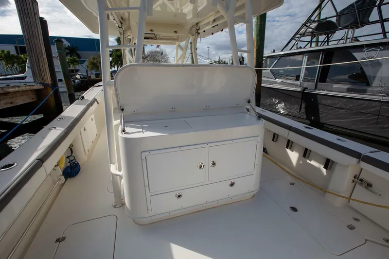 Evil Tequila Yacht Photos Pics 2015 Yellowfin 39 Offshore boat interior with storage compartments.