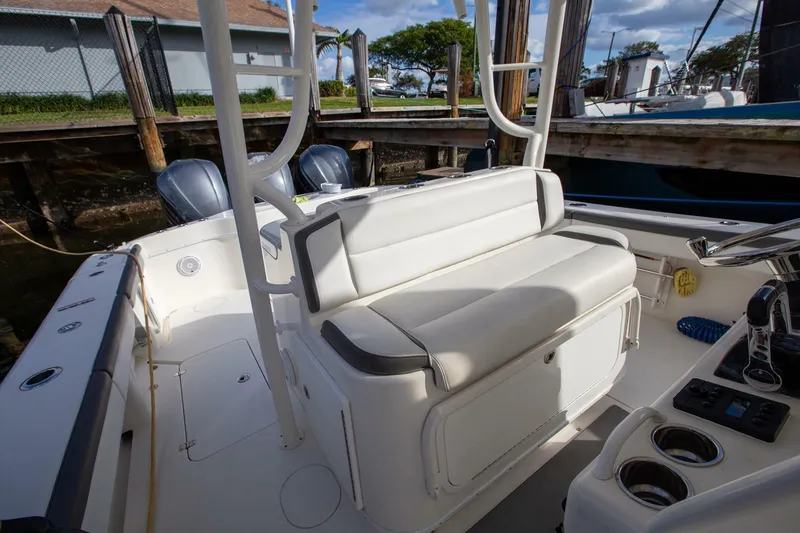Evil Tequila Yacht Photos Pics 2015 Yellowfin 39 Offshore boat interior with seating and controls.