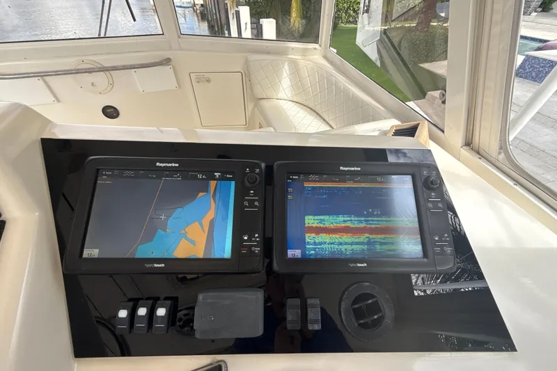Sweet Melissa Yacht Photos Pics Control panel of a 1992 Ocean Yachts 48 Super Sport with Raymarine displays.