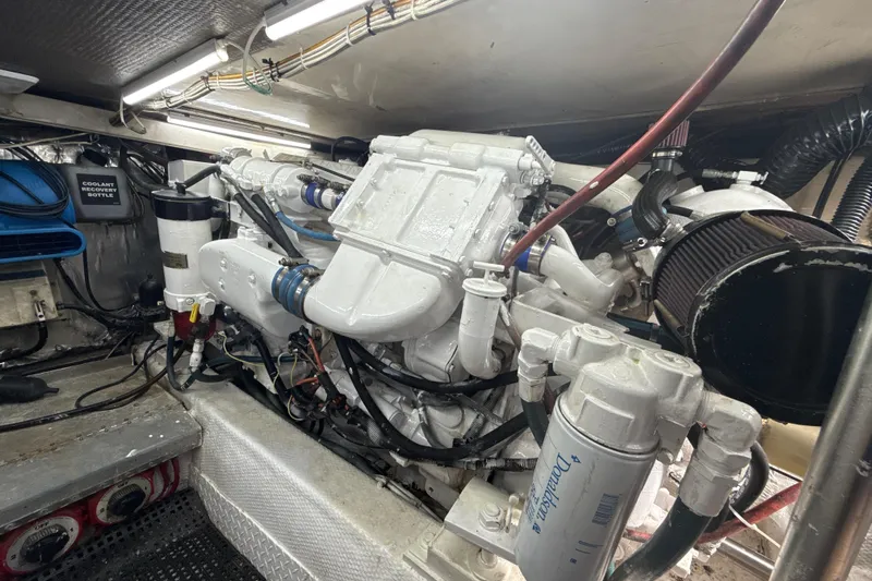 Sweet Melissa Yacht Photos Pics Engine room of a 1992 Ocean Yachts 48 Super Sport, showcasing detailed machinery.