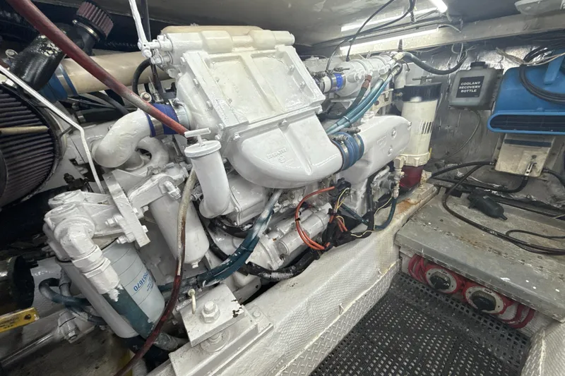 Sweet Melissa Yacht Photos Pics Engine room of a 1992 Ocean Yachts 48 Super Sport, showcasing detailed machinery and components.