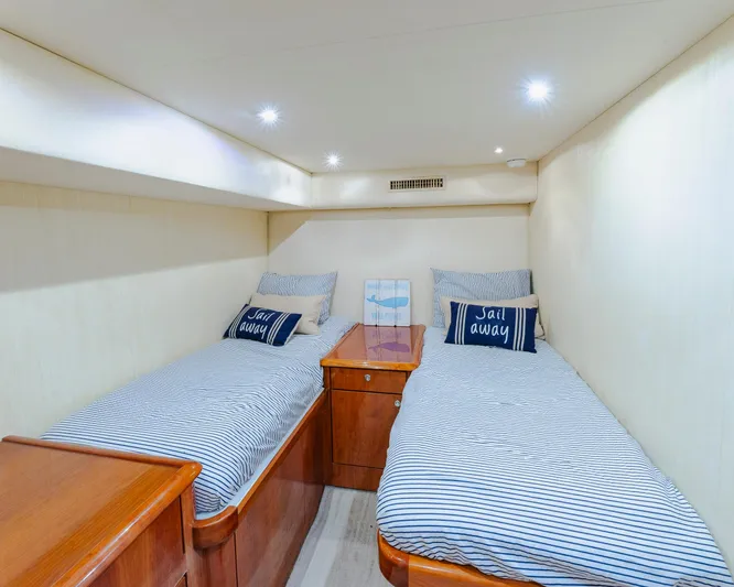 Wrangler Yacht Photos Pics Twin beds in a cozy cabin of a 2008 Ocean Yachts 54 Super Sport.
