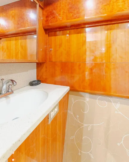 Wrangler Yacht Photos Pics Luxurious wooden bathroom interior on a 2008 Ocean Yachts 54 Super Sport.