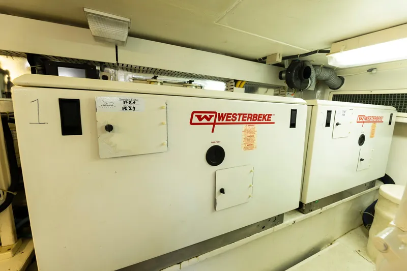 Wrangler Yacht Photos Pics Engine room of 2008 Ocean Yachts 54 Super Sport with Westerbeke generators.