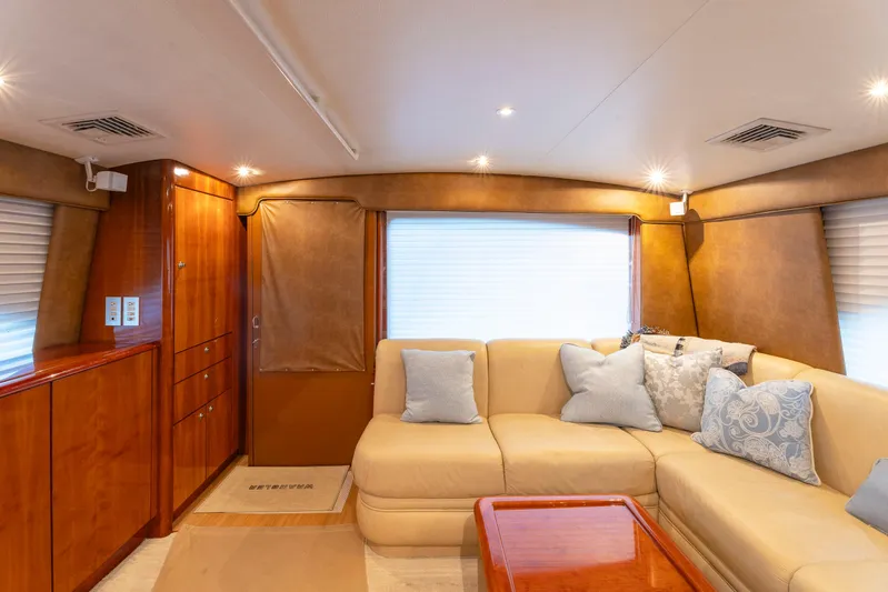 Wrangler Yacht Photos Pics Luxurious interior of 2008 Ocean Yachts 54 Super Sport with plush seating and elegant wood finishes.