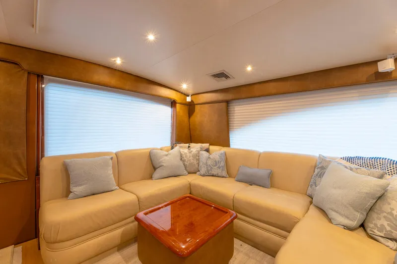 Wrangler Yacht Photos Pics Luxurious interior of 2008 Ocean Yachts 54 Super Sport with beige seating and cushions.