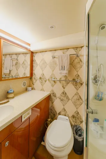 Wrangler Yacht Photos Pics Luxurious bathroom in 2008 Ocean Yachts 54 Super Sport with elegant fixtures and shower.