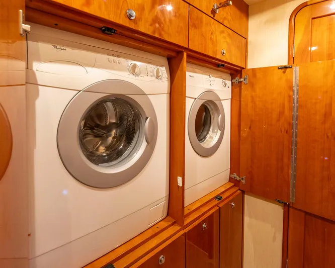 Wrangler Yacht Photos Pics Laundry area with washer and dryer on 2008 Ocean Yachts 54 Super Sport.