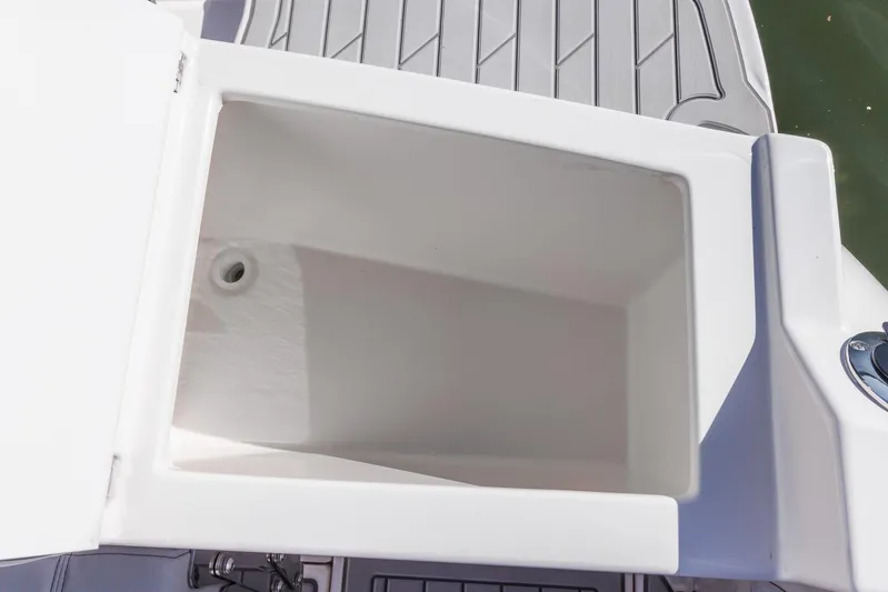  Yacht Photos Pics Open storage compartment on 2025 Solara S-250 Coupe boat deck.