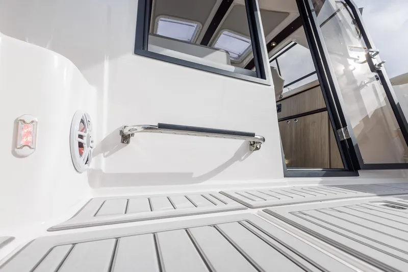  Yacht Photos Pics 2025 Solara S-250 Coupe boat deck with sleek design and modern features.