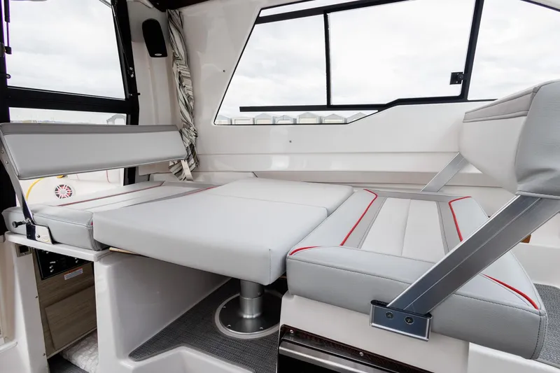  Yacht Photos Pics 2025 Solara S-250 Coupe interior with modern seating and sleek design.