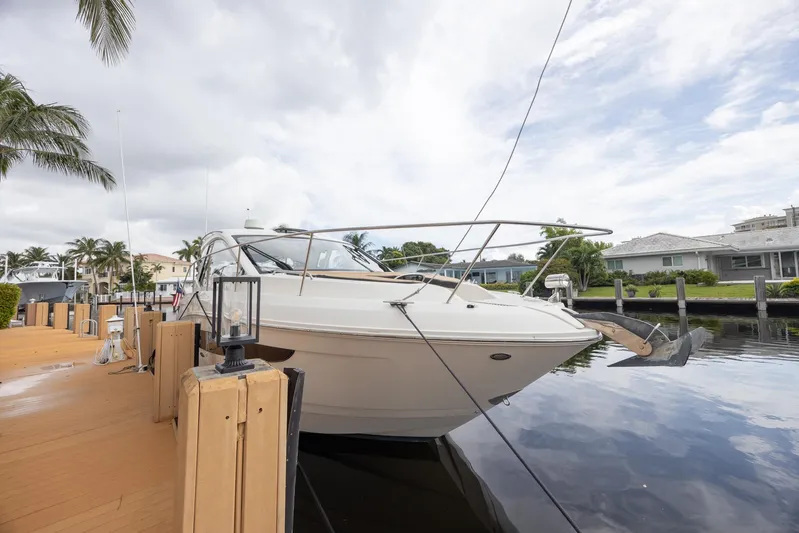  Yacht Photos Pics 2019 Sea Ray Sundancer 350 Coupe docked by waterfront homes.