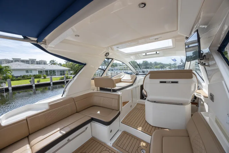  Yacht Photos Pics 2019 Sea Ray Sundancer 350 Coupe interior with spacious seating and elegant design.