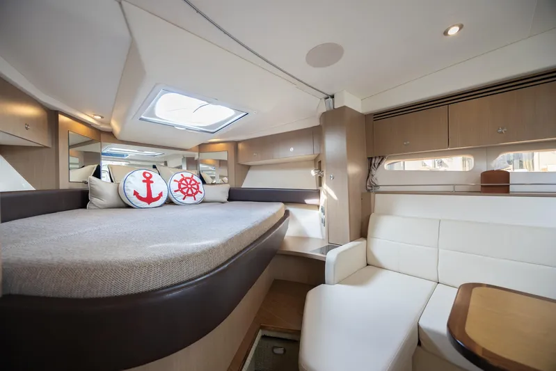  Yacht Photos Pics Luxurious interior of 2019 Sea Ray Sundancer 350 Coupe yacht cabin.