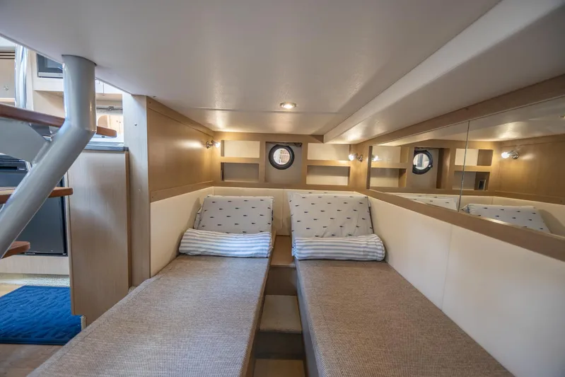  Yacht Photos Pics Interior cabin of 2019 Sea Ray Sundancer 350 Coupe with twin beds and modern design.