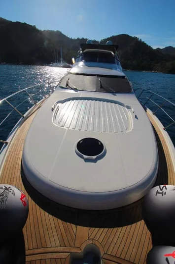  Yacht Photos Pics 2007 Azimut 68 FLY yacht on water, sunlit deck, scenic background.