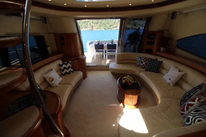  Yacht Photos Pics Luxurious interior of 2007 Azimut 68 FLY yacht with elegant seating and scenic ocean view.