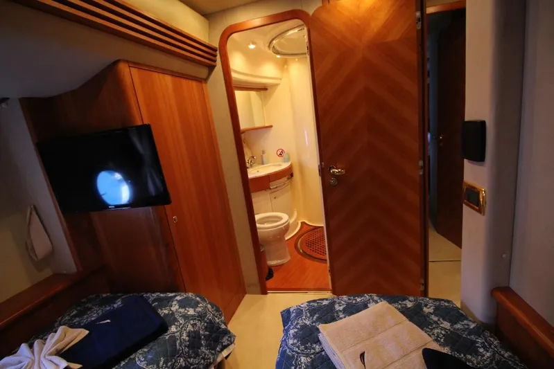  Yacht Photos Pics Luxurious cabin interior of 2007 Azimut 68 FLY yacht with ensuite bathroom.