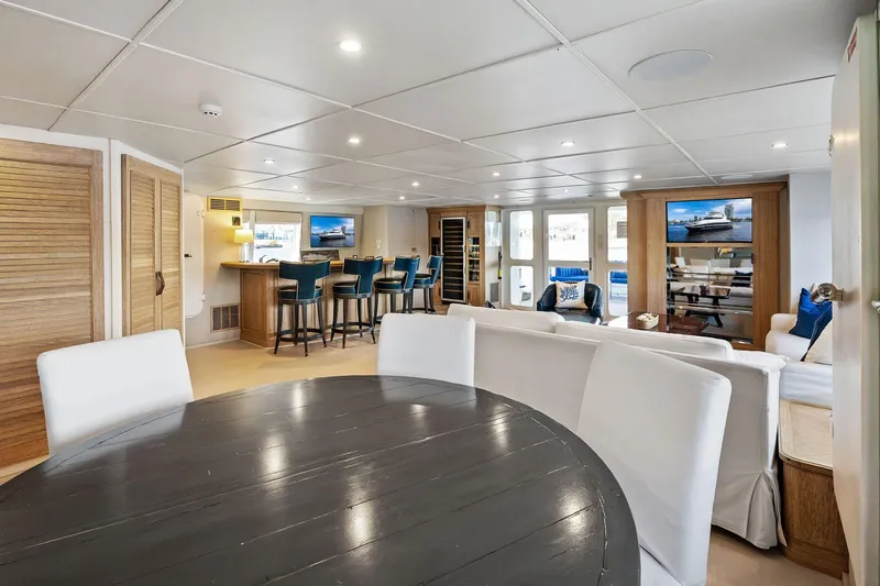 Pegasus Ix Yacht Photos Pics Luxurious 2004 Sabre 92 yacht interior with elegant seating, bar, and entertainment area.