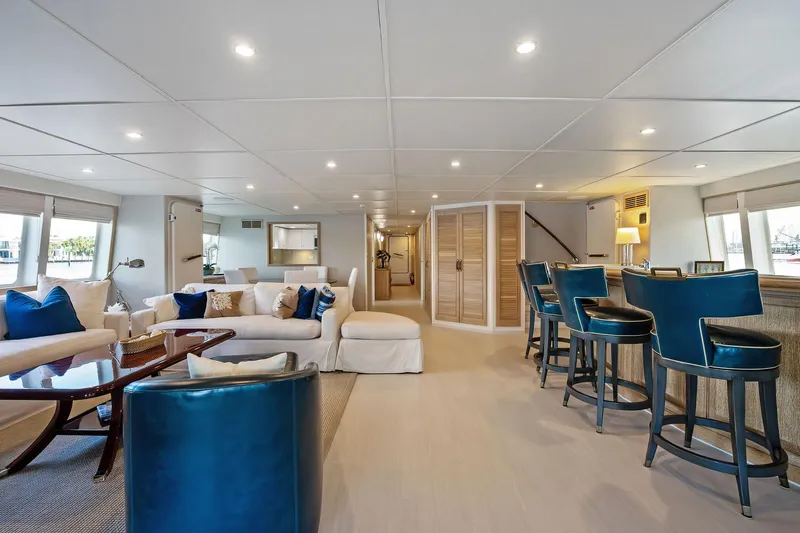 Pegasus Ix Yacht Photos Pics Luxurious interior of 2004 Sabre 92 yacht with elegant seating and bar area.