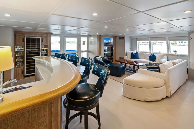 Pegasus Ix Yacht Photos Pics Luxurious interior of 2004 Sabre 92 yacht with elegant bar and comfortable seating.