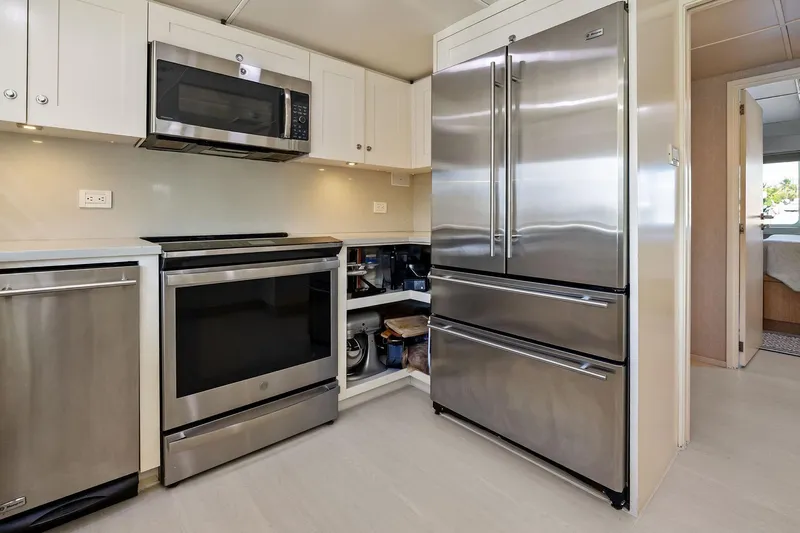 Pegasus Ix Yacht Photos Pics Modern kitchen with stainless steel appliances in a 2004 Sabre 92 yacht.