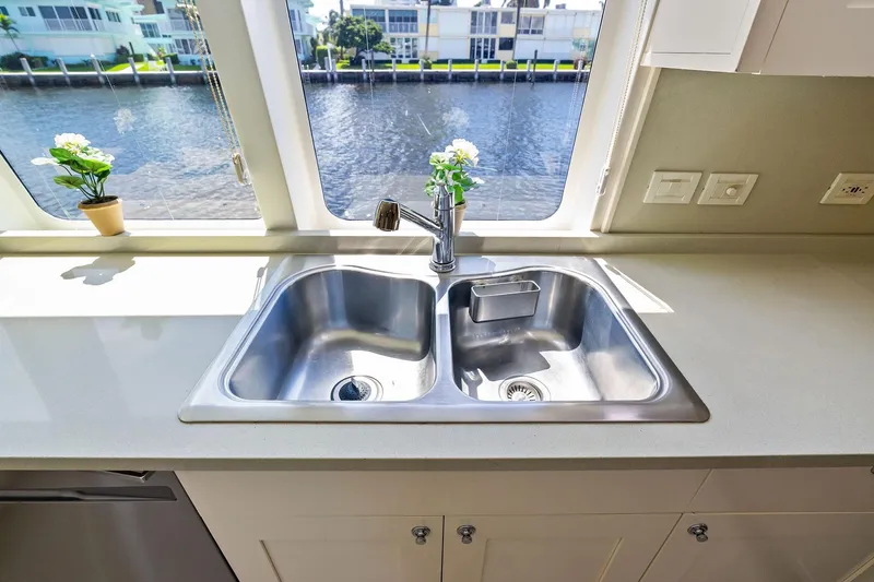 Pegasus Ix Yacht Photos Pics Modern kitchen sink on Sabre 92 yacht, 2004 model, with waterfront view.