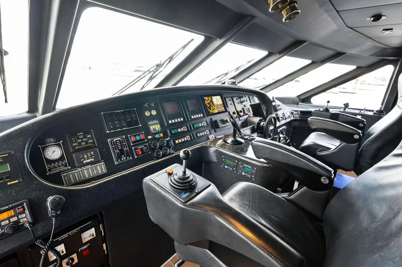 Pegasus Ix Yacht Photos Pics Cockpit of a 2004 Sabre 92 yacht with advanced navigation controls and seating.