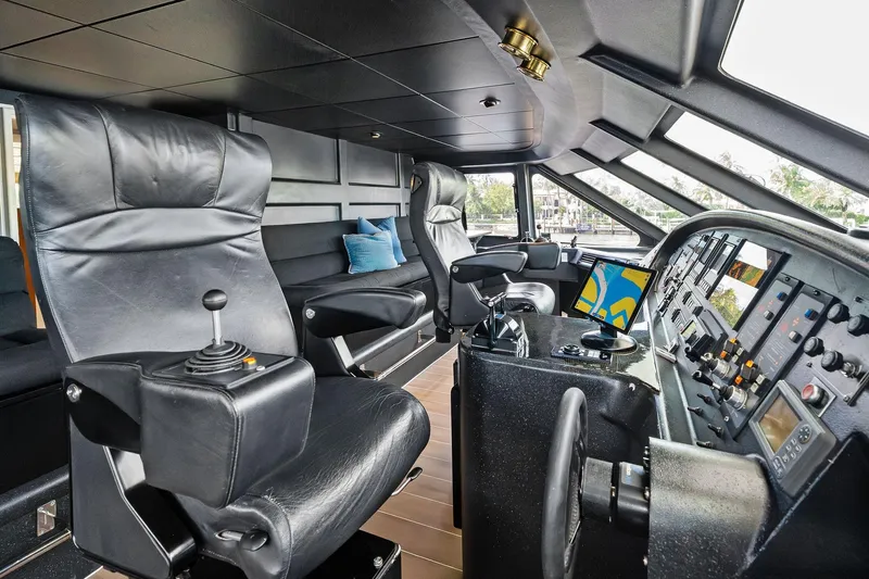 Pegasus Ix Yacht Photos Pics Interior of 2004 Sabre 92 yacht cockpit with leather seats and advanced navigation controls.